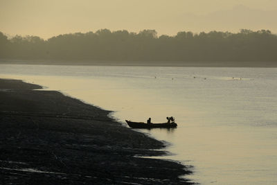 Tranquil seascape with boat on shallow water