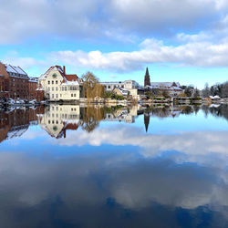 Reflection of buildings in lake