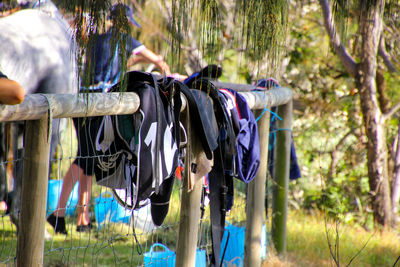 Close-up of clothes drying on railing