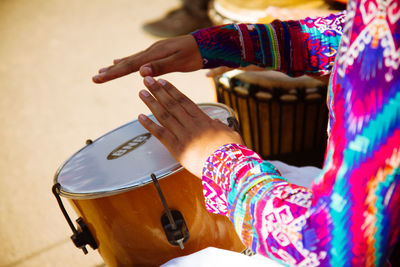 Woman standing at music concert