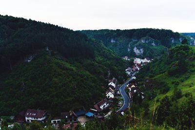 High angle view of trees and buildings against sky