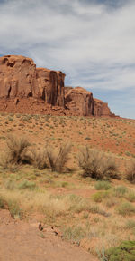 Rock formations on landscape against sky