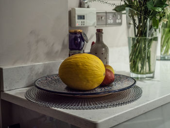 Close-up of fruits in plate on table