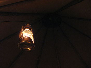 Low angle view of illuminated light bulb