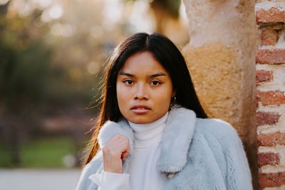 Portrait of girl standing outdoors