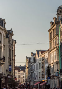 Low angle view of buildings against clear sky