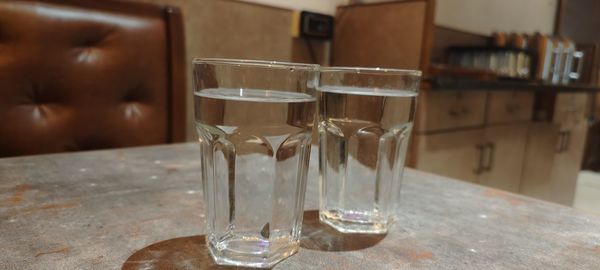 Close-up of drinking glass on table