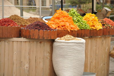 Various food in containers for sale at market