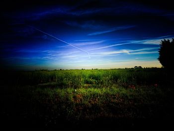 Countryside landscape against blue sky