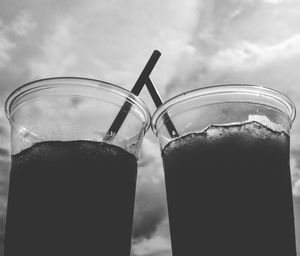 Close-up of drinks against sky