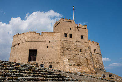 Low angle view of historic building against sky