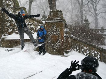 Person standing on snow covered landscape