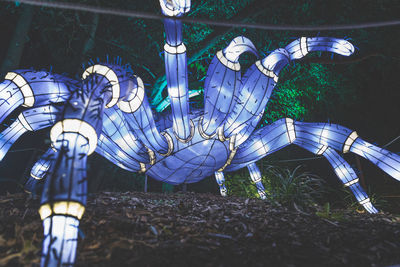 Close-up of sculpture on field in yard