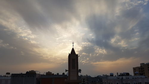 Panoramic view of buildings against sky during sunset