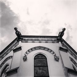 Low angle view of ornate building against sky