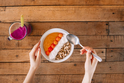 High angle view of man having breakfast