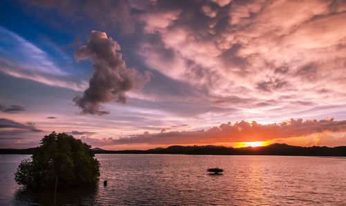 Scenic view of sea against sky during sunset