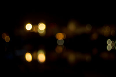 Defocused image of illuminated lights at night