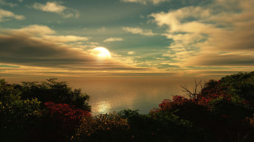 Scenic view of sea against sky during sunset