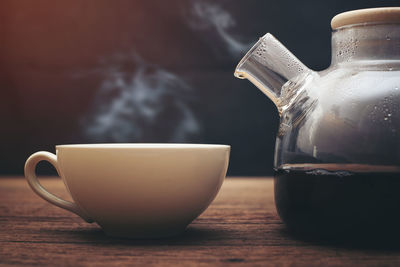 Close-up of coffee cup on table