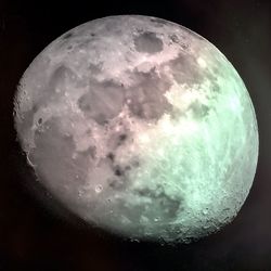 Low angle view of moon against sky