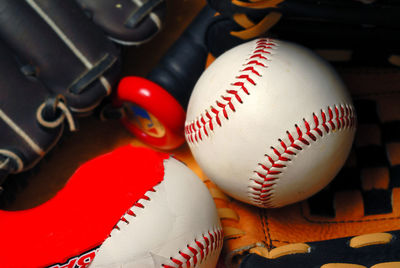 Close-up of baseballs and glove