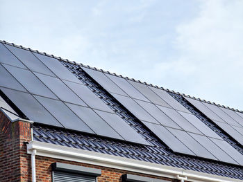 Low angle view of solar panel against sky