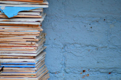 Close-up of books on wall