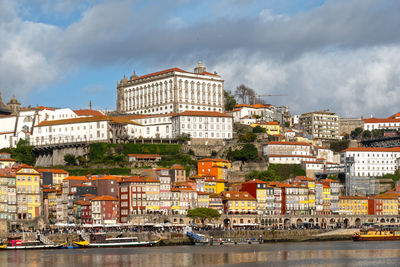 Buildings in city against sky