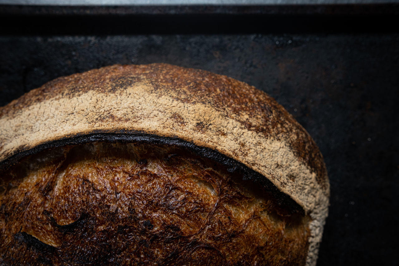 CLOSE-UP OF BREAD IN GLASS