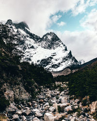 Scenic view of snowcapped mountains against sky