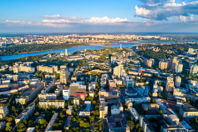 High angle view of city buildings against sky