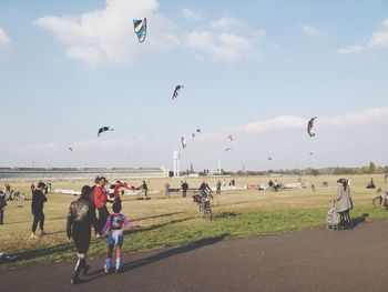 People flying over city