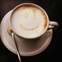 Close-up of cappuccino on table