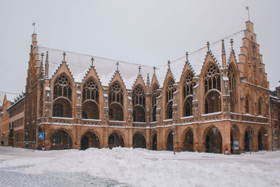 View of building against clear sky during winter