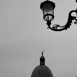 Low angle view of street light against sky
