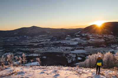 Sunrise on skalka mountain with a view of smrk mountain and lysa hora in the beskydy mountains 