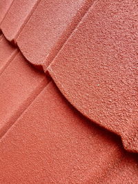 A close-up of red galvalum roof