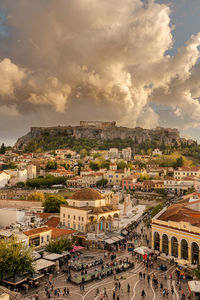 High angle view of townscape against cloudy sky