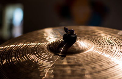 Close-up of cymbal in room