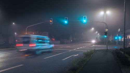 Illuminated street at night