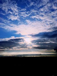 Scenic view of silhouette landscape against sky during sunset