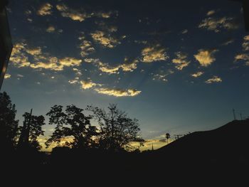 Silhouette trees against sky