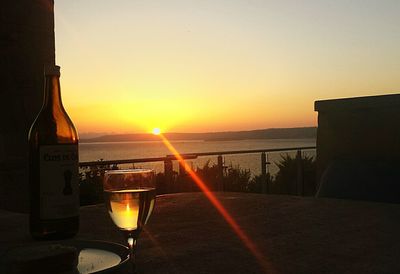 Scenic view of sea at sunset