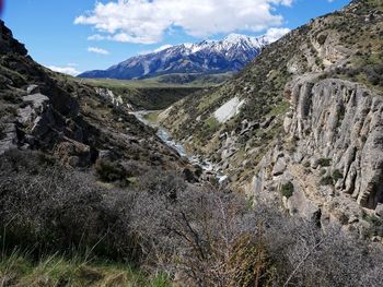 Scenic view of rocky mountains against sky