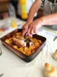 Close-up of man eating food