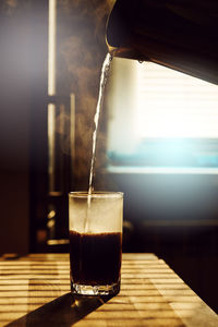 Close-up of coffee cup on table