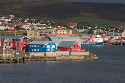 Houses by sea in town