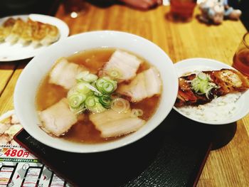 Close-up of soup served on table