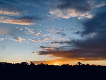 Scenic view of silhouette landscape against sky during sunset